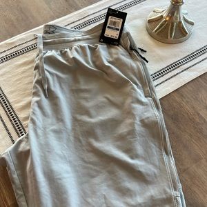 Brand new XL Men's UA Vanish Pants-gray.